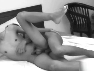 Asian twink gives footjob